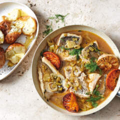 Poached fish with crispy jacket potatoes