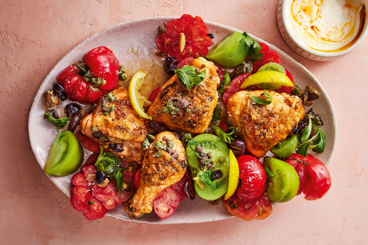 Roast lemon-and-olive chicken with cold caper dressed tomatoes