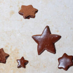 Chocolate-dipped star biscuits