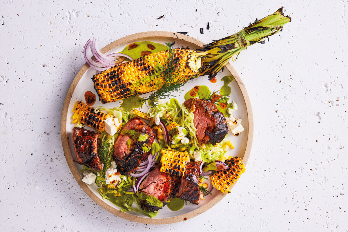 GRIDDLED SMOKY MEXICAN PORK WITH CHARRED CORN, LIME AND FETA SLAW