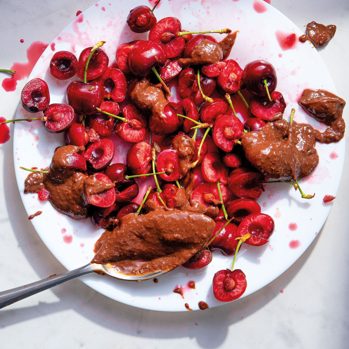 Cherries with coconut Chuckles chocolate sauce Woolworths TASTE