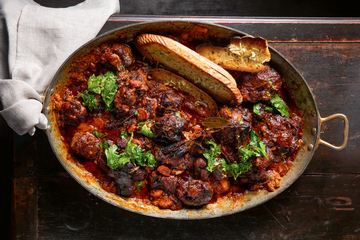 CLEM’S OSSO BUCCO- STYLE OXTAIL WITH GARLIC BREAD AND GREMOLATA