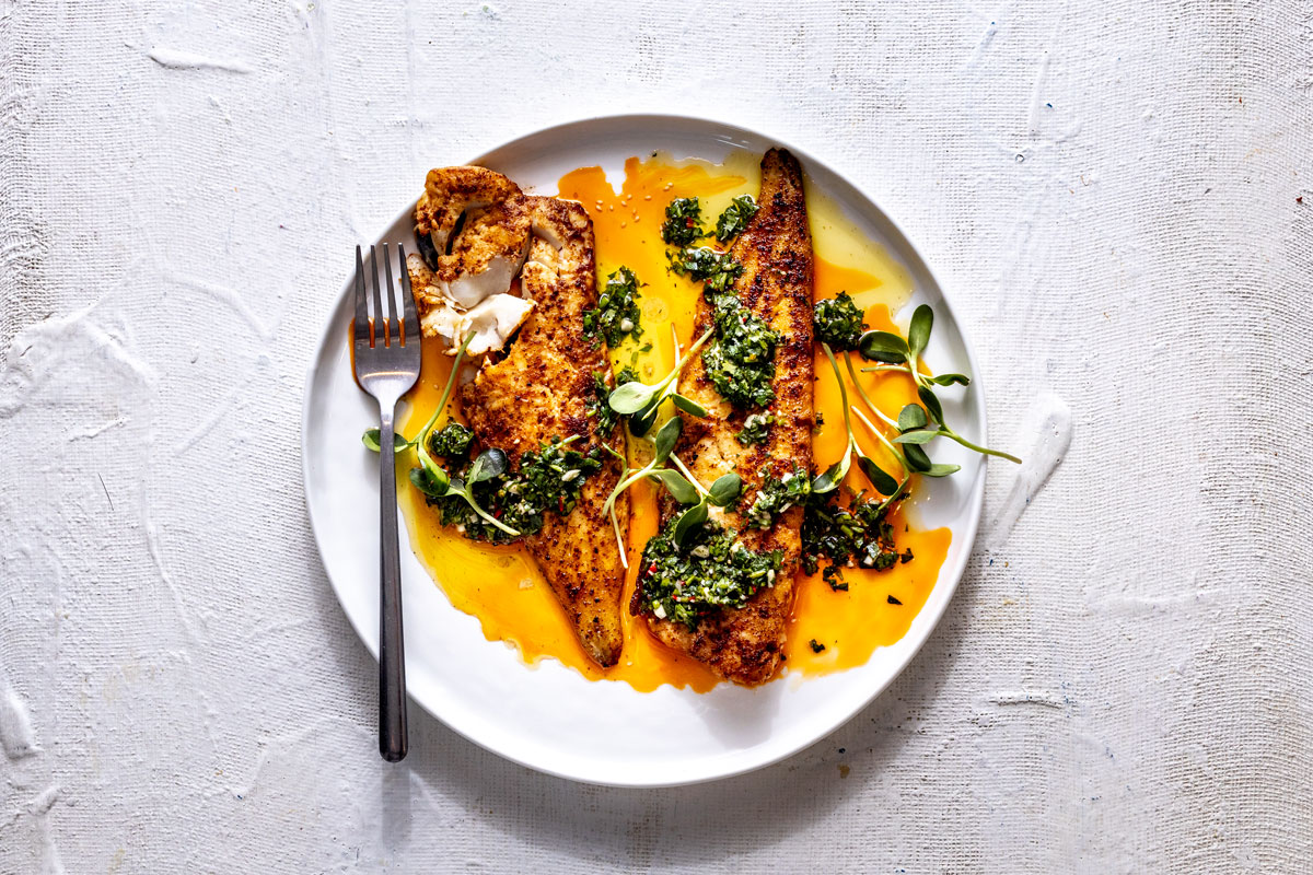 White fish fillets with chimichurri sauce