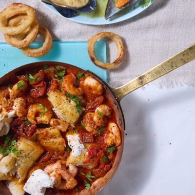 Hake and prawn skillet