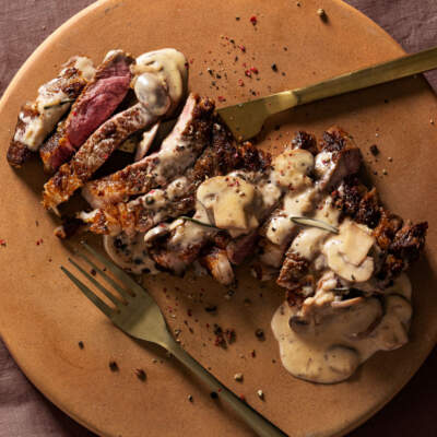 Pink roasted steak with mushroom-and-pepper sauce