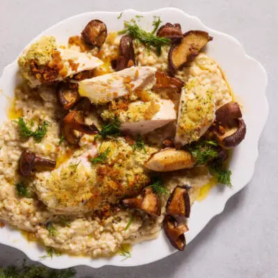 Chicken breasts topped with mushroom risotto