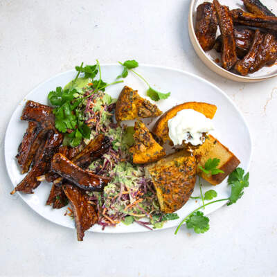 Shisanyama-style lamb riblets with cornbread and slaw