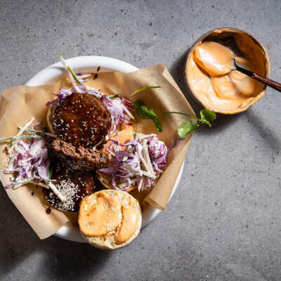 Asian-inspired plant-based burger with crisp slaw