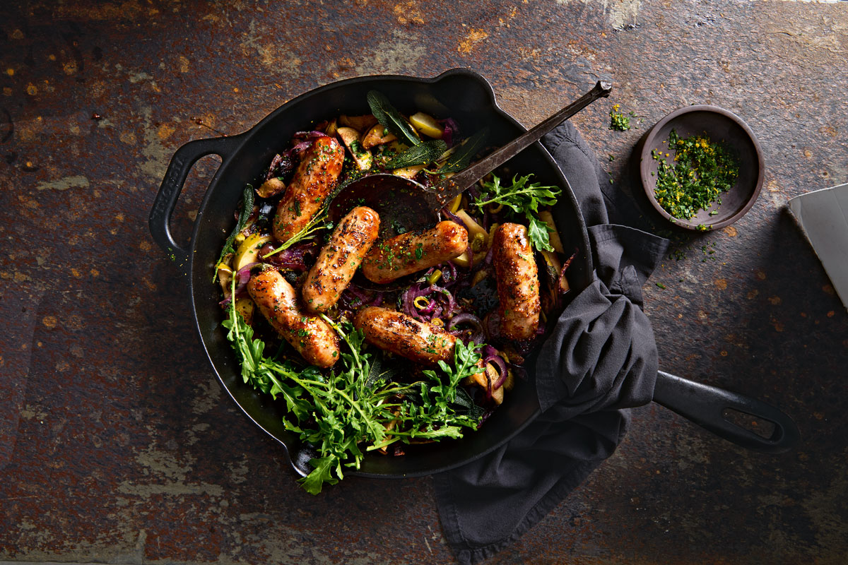 One-pan sausage roast with fennel, apples and onions | Woolworths TASTE