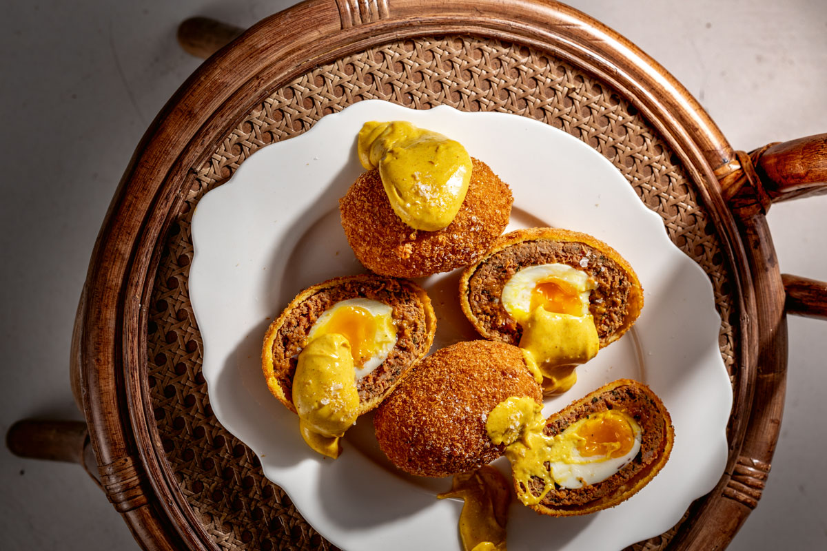 Scotch eggs with coronation sauce