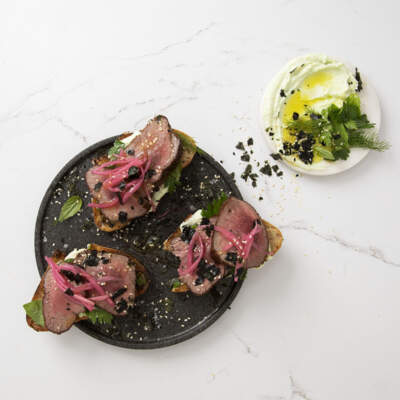 Open ostrich steak sandwich
