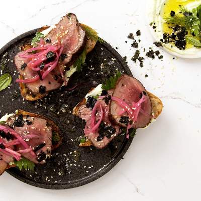 Open ostrich steak sandwich
