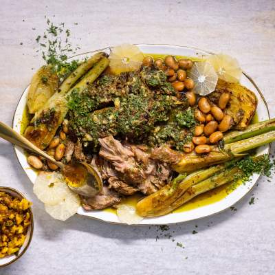 Herby slow-cooked lamb shoulder with preserved lemon