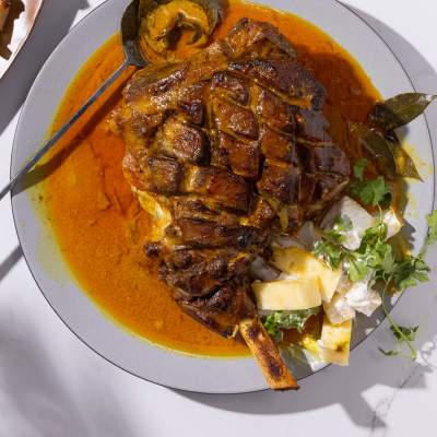Slow-roasted curried leg of lamb with pineapple raita