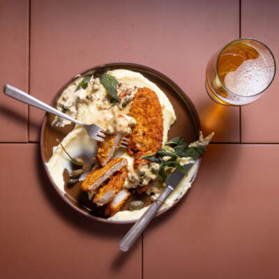Crumbed pork with creamy sage-and-caper sauce