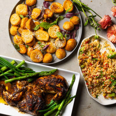 Butterflied chicken, roast potatoes and savoury rice for friendsmas