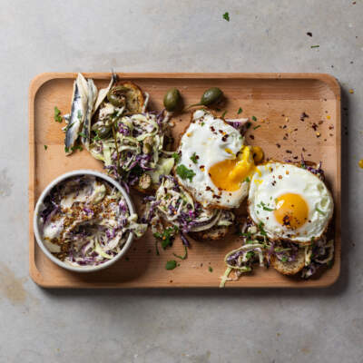 Caesar cabbage slaw on sourdough with fried eggs
