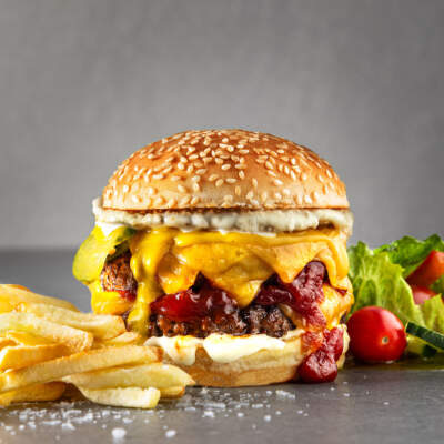 Cheesy burger with three sauces