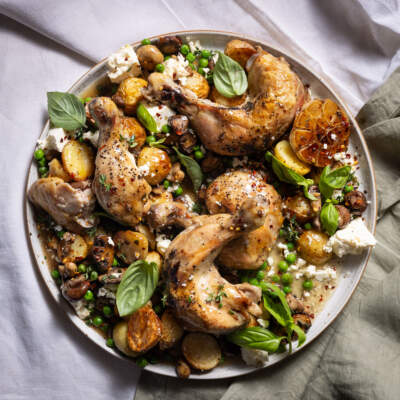 Confit chicken with crispy baby potatoes and thyme mushrooms
