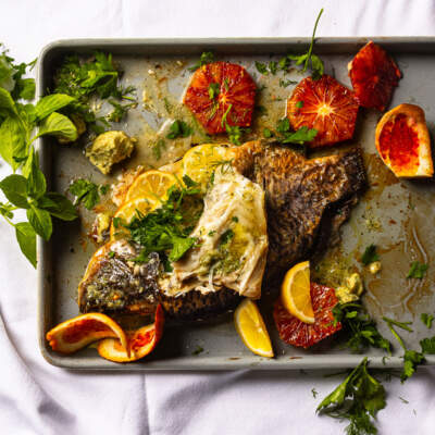 Whole stuffed tilapia with lemon & garlic butter and blood orange salad