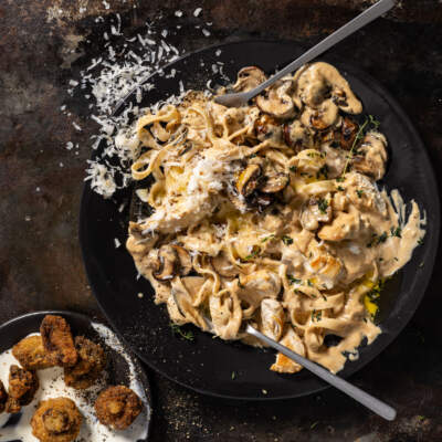 Chicken stroganoff and crumbed mushrooms