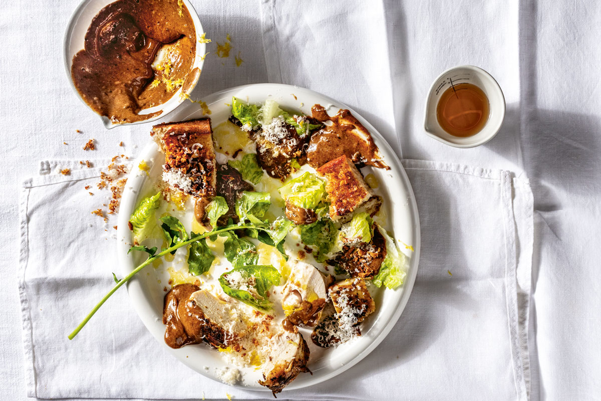 CAESAR SALAD WITH BLACK GARLIC AÏOLI, XXL MISO BROWN BUTTER CROUTONS AND CRISPY ONIONS