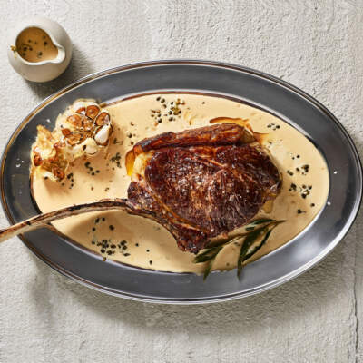 Coal-roasted rib-eye with peppercorn-and-miso cream